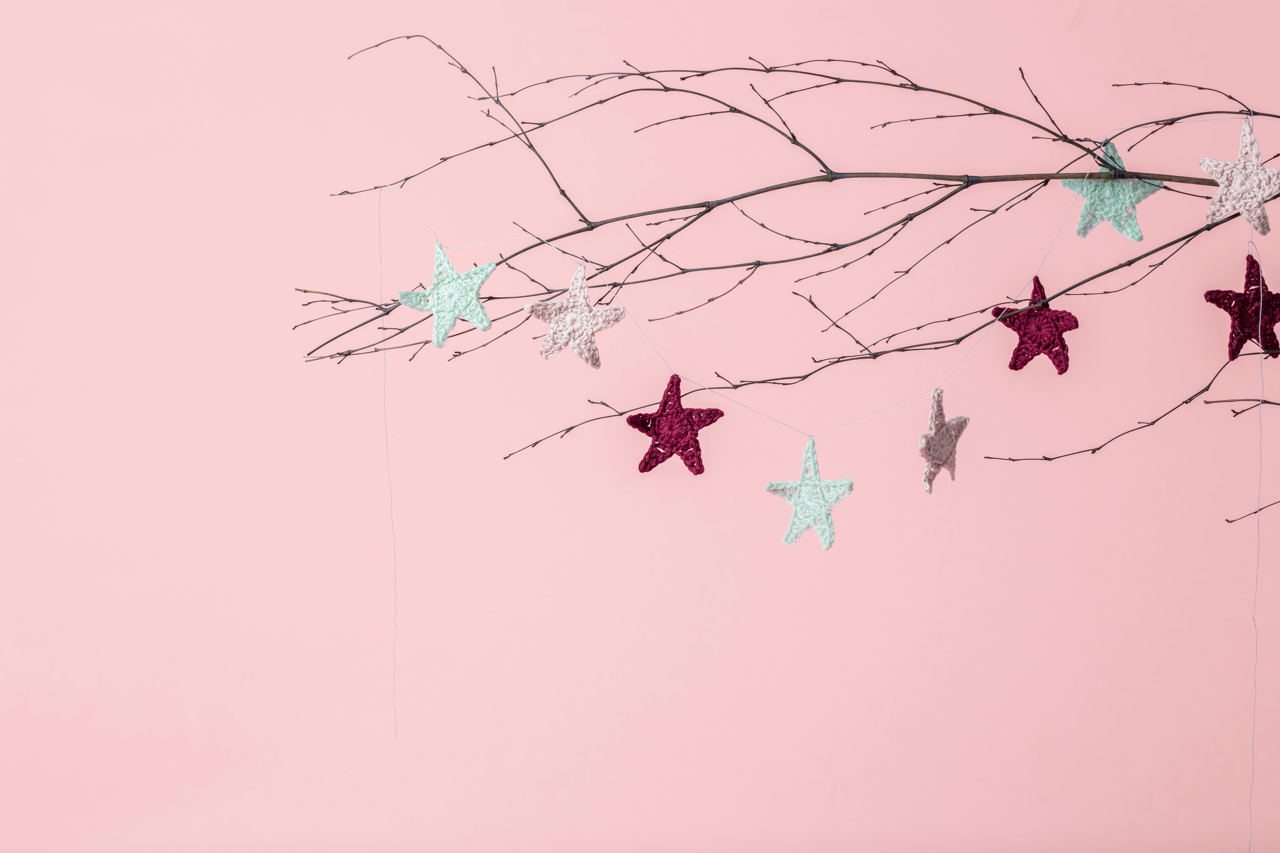 star decorations in tree